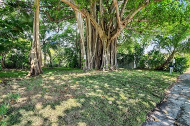 A beautifully treed vacant lot, 135 X 87.50, ready to build and on Lake Worth Municipal Golf Course in Florida - for sale on GolfHomes.com, golf home, golf lot