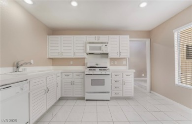 Single story attached home in Spanish Trail- Fabulous golf on Spanish Trail Golf and Country Club in Nevada - for sale on GolfHomes.com, golf home, golf lot