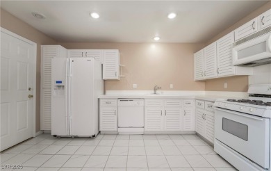 Single story attached home in Spanish Trail- Fabulous golf on Spanish Trail Golf and Country Club in Nevada - for sale on GolfHomes.com, golf home, golf lot