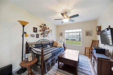 Enjoy waterfront living in this turnkey bright end-unit villa on Sabal Trace Golf and Country Club in Florida - for sale on GolfHomes.com, golf home, golf lot