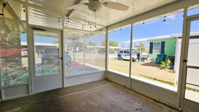 Welcome to your perfect retirement oasis in the charming city of on Herons Glen Golf and Country Club in Florida - for sale on GolfHomes.com, golf home, golf lot