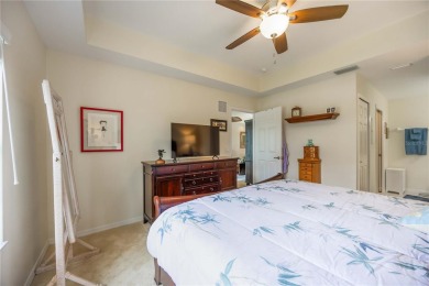 Enjoy waterfront living in this turnkey bright end-unit villa on Sabal Trace Golf and Country Club in Florida - for sale on GolfHomes.com, golf home, golf lot