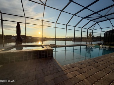 Welcome to 301 Stirling Bridge Drive, where breathtaking western on Plantation Bay Golf and Country Club in Florida - for sale on GolfHomes.com, golf home, golf lot