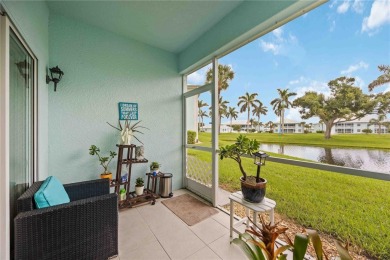 Enjoy waterfront living in this turnkey bright end-unit villa on Sabal Trace Golf and Country Club in Florida - for sale on GolfHomes.com, golf home, golf lot