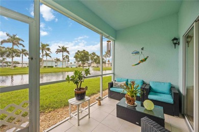 Enjoy waterfront living in this turnkey bright end-unit villa on Sabal Trace Golf and Country Club in Florida - for sale on GolfHomes.com, golf home, golf lot