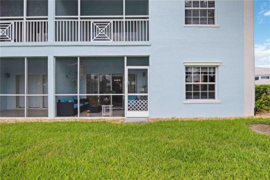 Enjoy waterfront living in this turnkey bright end-unit villa on Sabal Trace Golf and Country Club in Florida - for sale on GolfHomes.com, golf home, golf lot
