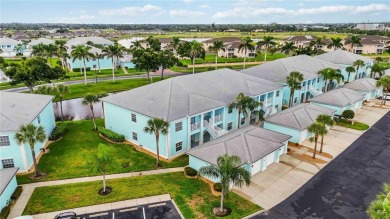 Enjoy waterfront living in this turnkey bright end-unit villa on Sabal Trace Golf and Country Club in Florida - for sale on GolfHomes.com, golf home, golf lot