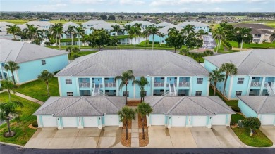 Enjoy waterfront living in this turnkey bright end-unit villa on Sabal Trace Golf and Country Club in Florida - for sale on GolfHomes.com, golf home, golf lot