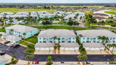 Enjoy waterfront living in this turnkey bright end-unit villa on Sabal Trace Golf and Country Club in Florida - for sale on GolfHomes.com, golf home, golf lot