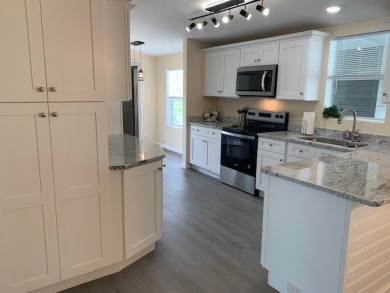 Listed by the Official Sales Team of Cypress Lakes Village on Big Cypress Golf and Country Club in Florida - for sale on GolfHomes.com, golf home, golf lot