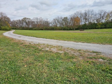 Location, location, location! Prime lot awaits new construction! on University Club of Kentucky in Kentucky - for sale on GolfHomes.com, golf home, golf lot