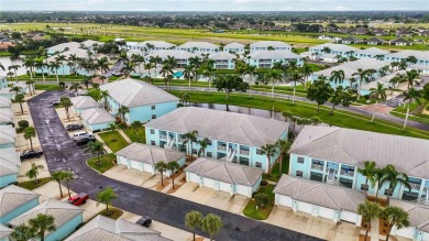 Enjoy waterfront living in this turnkey bright end-unit villa on Sabal Trace Golf and Country Club in Florida - for sale on GolfHomes.com, golf home, golf lot