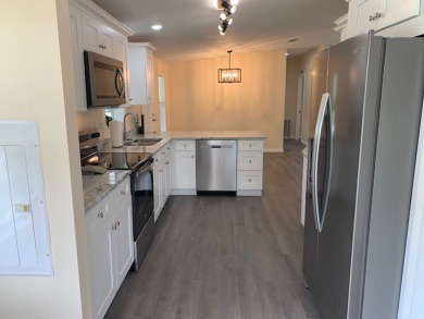 Listed by the Official Sales Team of Cypress Lakes Village on Big Cypress Golf and Country Club in Florida - for sale on GolfHomes.com, golf home, golf lot