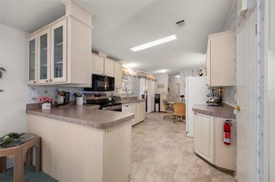 Discover an exceptional opportunity to own a spacious, furnished on Kings Gate Golf Club in Florida - for sale on GolfHomes.com, golf home, golf lot