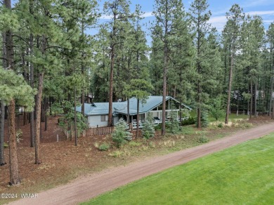 **Welcome to Your Dream Getaway Cabin**
Nestled in the heart of on Pinetop Lakes Country Club in Arizona - for sale on GolfHomes.com, golf home, golf lot