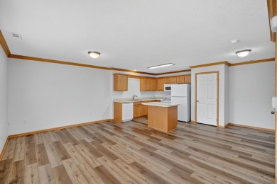 Popular tri-level townhome in West Des Moines, moments from Des on Des Moines Golf and Country Club in Iowa - for sale on GolfHomes.com, golf home, golf lot