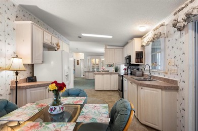 Discover an exceptional opportunity to own a spacious, furnished on Kings Gate Golf Club in Florida - for sale on GolfHomes.com, golf home, golf lot