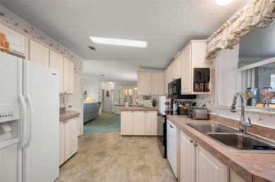 Discover an exceptional opportunity to own a spacious, furnished on Kings Gate Golf Club in Florida - for sale on GolfHomes.com, golf home, golf lot