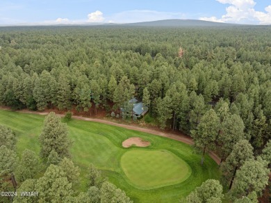 **Welcome to Your Dream Getaway Cabin**
Nestled in the heart of on Pinetop Lakes Country Club in Arizona - for sale on GolfHomes.com, golf home, golf lot