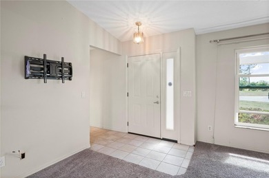 Three Bedroom, Two Bath, attached Two Car Garage Home located on on Deep Creek Golf Club in Florida - for sale on GolfHomes.com, golf home, golf lot