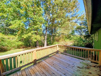 Picture yourself sitting on this deck, overlooking your nice big on The Course At Turkey Mountain in Arkansas - for sale on GolfHomes.com, golf home, golf lot
