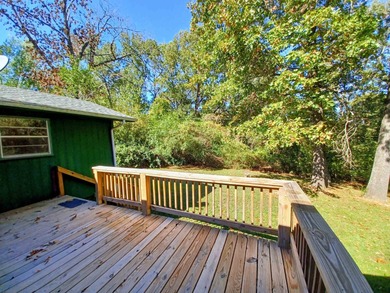 Picture yourself sitting on this deck, overlooking your nice big on The Course At Turkey Mountain in Arkansas - for sale on GolfHomes.com, golf home, golf lot