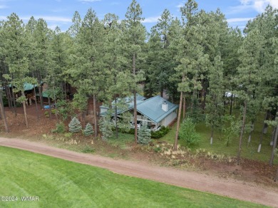 **Welcome to Your Dream Getaway Cabin**
Nestled in the heart of on Pinetop Lakes Country Club in Arizona - for sale on GolfHomes.com, golf home, golf lot