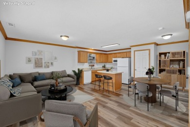 Popular tri-level townhome in West Des Moines, moments from Des on Des Moines Golf and Country Club in Iowa - for sale on GolfHomes.com, golf home, golf lot