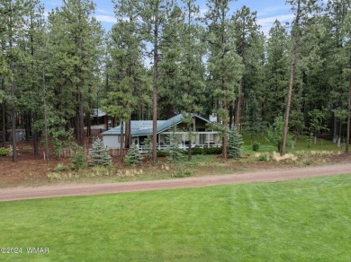 **Welcome to Your Dream Getaway Cabin**
Nestled in the heart of on Pinetop Lakes Country Club in Arizona - for sale on GolfHomes.com, golf home, golf lot