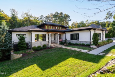 Elegant Modern Style home with views of a forested backyard and on The Preserve At Jordan Lake Golf Club in North Carolina - for sale on GolfHomes.com, golf home, golf lot