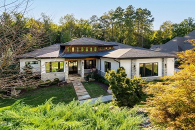Elegant Modern Style home with views of a forested backyard and on The Preserve At Jordan Lake Golf Club in North Carolina - for sale on GolfHomes.com, golf home, golf lot