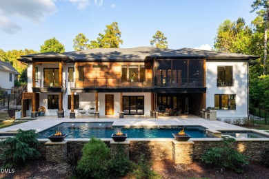 Elegant Modern Style home with views of a forested backyard and on The Preserve At Jordan Lake Golf Club in North Carolina - for sale on GolfHomes.com, golf home, golf lot