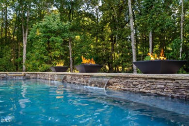 Elegant Modern Style home with views of a forested backyard and on The Preserve At Jordan Lake Golf Club in North Carolina - for sale on GolfHomes.com, golf home, golf lot