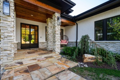 Elegant Modern Style home with views of a forested backyard and on The Preserve At Jordan Lake Golf Club in North Carolina - for sale on GolfHomes.com, golf home, golf lot