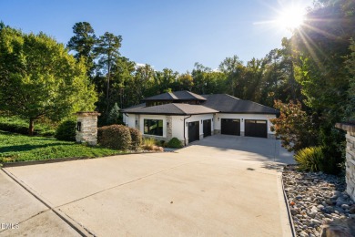 Elegant Modern Style home with views of a forested backyard and on The Preserve At Jordan Lake Golf Club in North Carolina - for sale on GolfHomes.com, golf home, golf lot