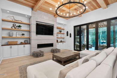 Elegant Modern Style home with views of a forested backyard and on The Preserve At Jordan Lake Golf Club in North Carolina - for sale on GolfHomes.com, golf home, golf lot