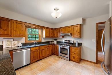 Welcome to this charming and spacious home nestled on nearly an on North Shore Country Club in Wisconsin - for sale on GolfHomes.com, golf home, golf lot