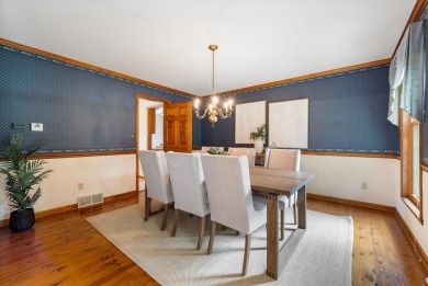 Welcome to this charming and spacious home nestled on nearly an on North Shore Country Club in Wisconsin - for sale on GolfHomes.com, golf home, golf lot