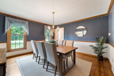 Welcome to this charming and spacious home nestled on nearly an on North Shore Country Club in Wisconsin - for sale on GolfHomes.com, golf home, golf lot