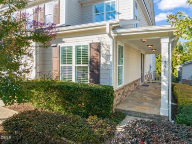 Discover luxury living in this stunning, end-unit townhome on on TPC at Wakefield Plantation in North Carolina - for sale on GolfHomes.com, golf home, golf lot