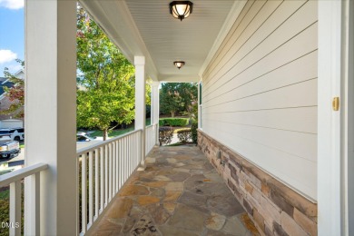 Discover luxury living in this stunning, end-unit townhome on on TPC at Wakefield Plantation in North Carolina - for sale on GolfHomes.com, golf home, golf lot
