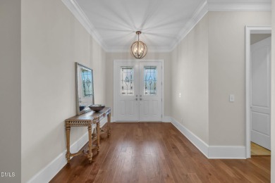 Discover luxury living in this stunning, end-unit townhome on on TPC at Wakefield Plantation in North Carolina - for sale on GolfHomes.com, golf home, golf lot