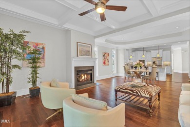 Discover luxury living in this stunning, end-unit townhome on on TPC at Wakefield Plantation in North Carolina - for sale on GolfHomes.com, golf home, golf lot