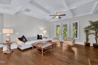 Discover luxury living in this stunning, end-unit townhome on on TPC at Wakefield Plantation in North Carolina - for sale on GolfHomes.com, golf home, golf lot