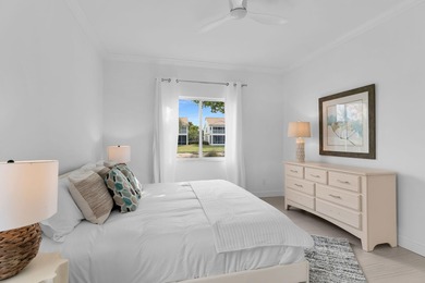 Enjoy refined living in this fully renovated end-unit residence on Glen Eagle Golf and Country Club in Florida - for sale on GolfHomes.com, golf home, golf lot