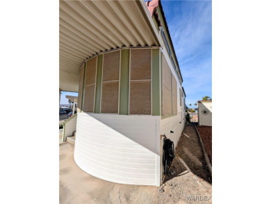 This is a beautiful home. New vinyl plank flooring in family on Riverview Golf Course in Arizona - for sale on GolfHomes.com, golf home, golf lot