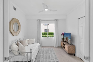 Enjoy refined living in this fully renovated end-unit residence on Glen Eagle Golf and Country Club in Florida - for sale on GolfHomes.com, golf home, golf lot