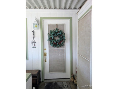 This is a beautiful home. New vinyl plank flooring in family on Riverview Golf Course in Arizona - for sale on GolfHomes.com, golf home, golf lot