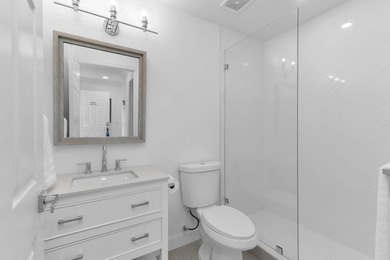 Enjoy refined living in this fully renovated end-unit residence on Glen Eagle Golf and Country Club in Florida - for sale on GolfHomes.com, golf home, golf lot