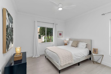 Enjoy refined living in this fully renovated end-unit residence on Glen Eagle Golf and Country Club in Florida - for sale on GolfHomes.com, golf home, golf lot